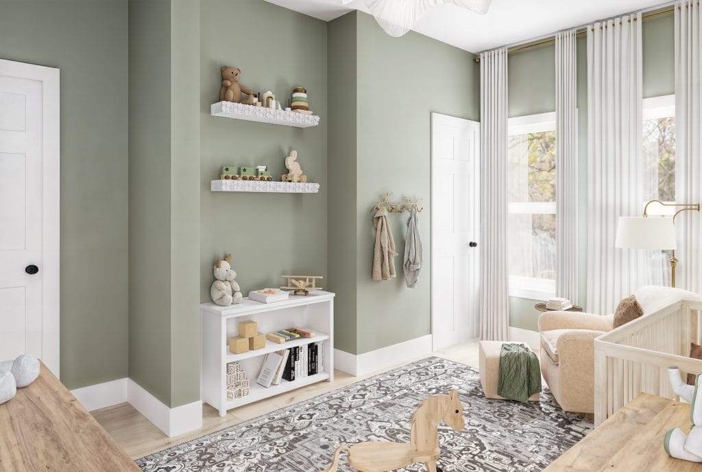 Couleurs douces et décor ludique dans une chambre de bébé neutre par Decorilla